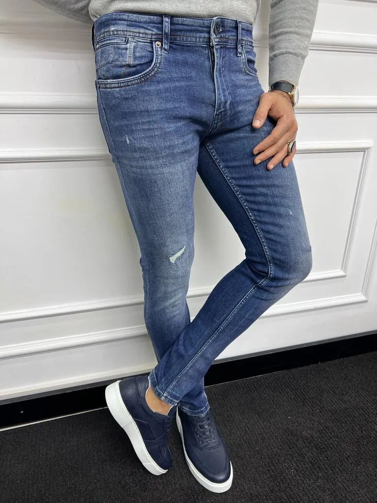 Blue Slim Fit Distress Jeans for Men by GentWith.com