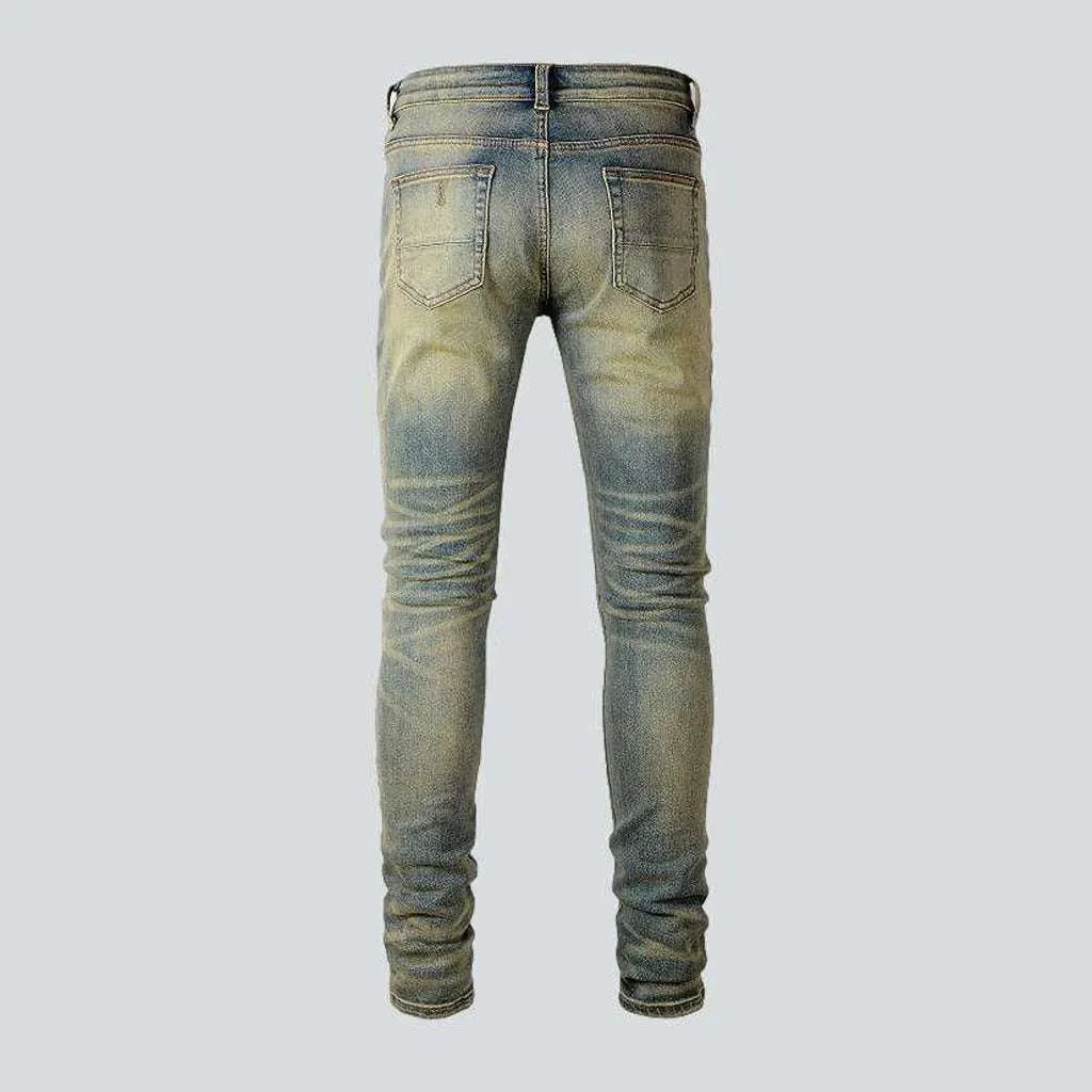 Cracked patch skinny men's jeans