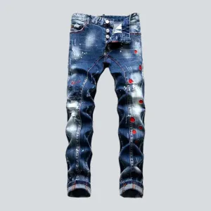 Mid-waist men's paint-splatter jeans