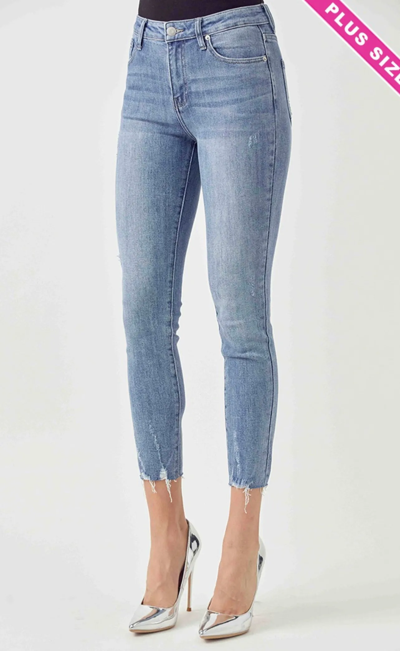 Risen Mid Rise Skinny Jeans